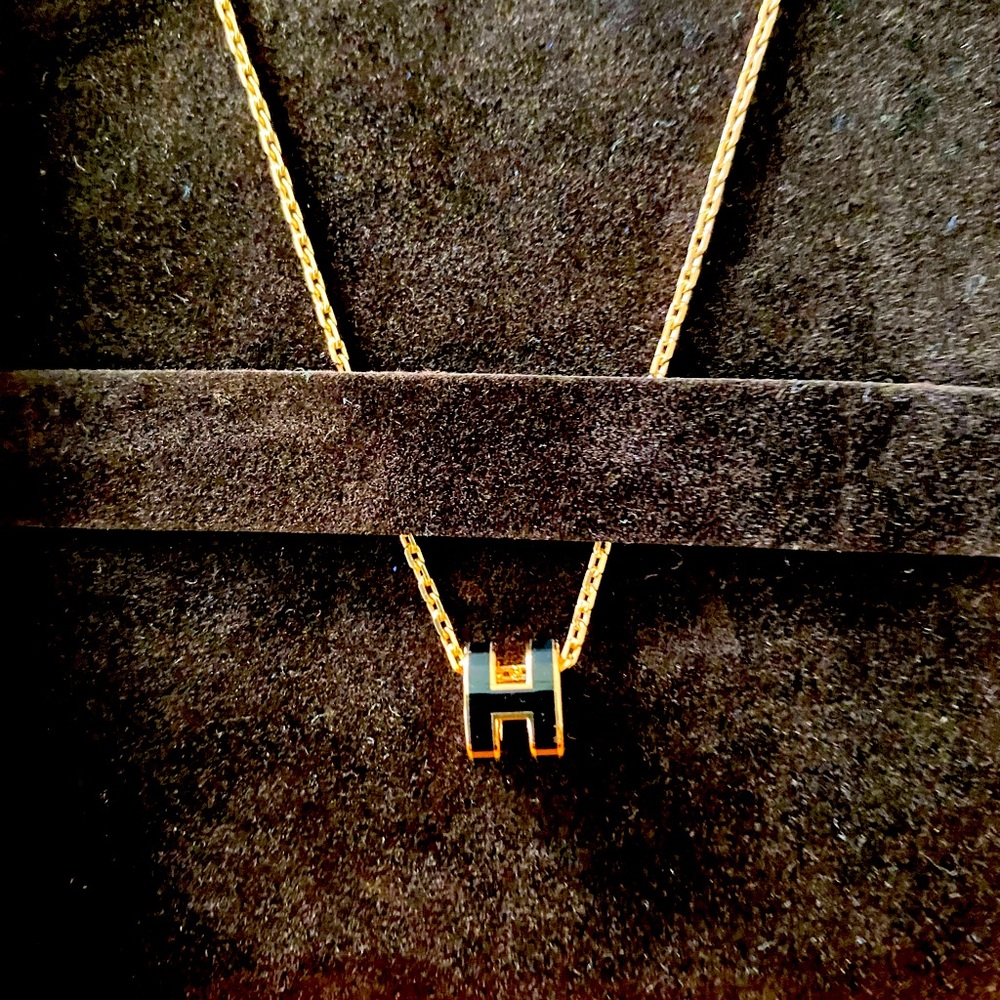 Hermes Pop H small necklace with black H and gold chain. New, never worn.